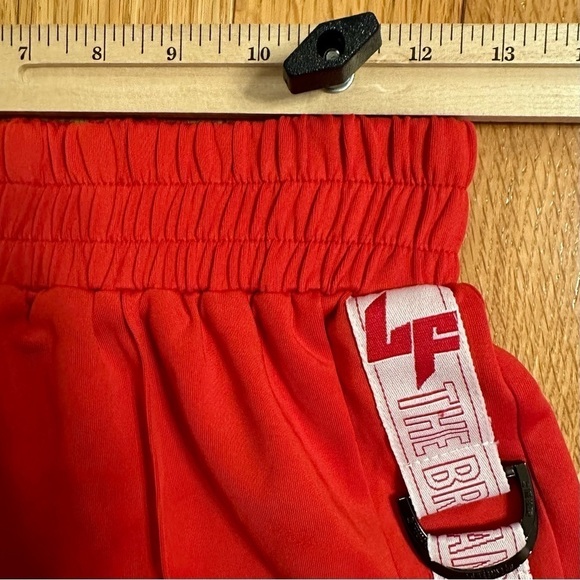LF the Brand 80s style Red Buckle Track Short Shorts Women’s Size S/M - Picture 12 of 16